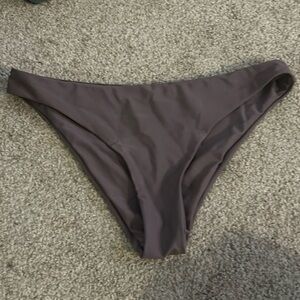 brown bathing suit bottoms and top